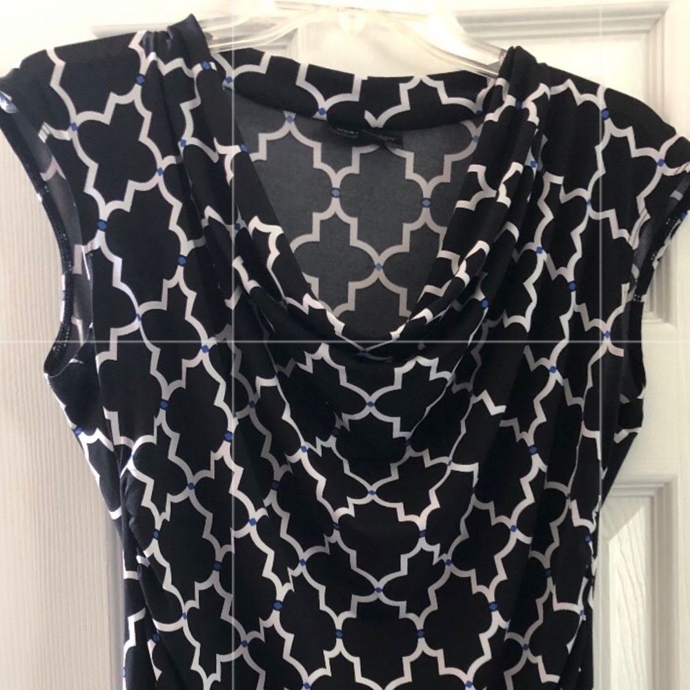 PM dressy black blouse w blue dots throughout.